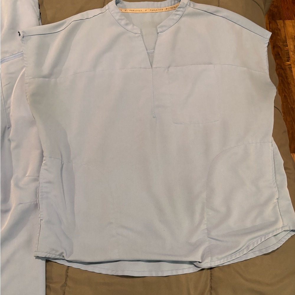 Fabletics Soft blue scrubs Evolve Style Top